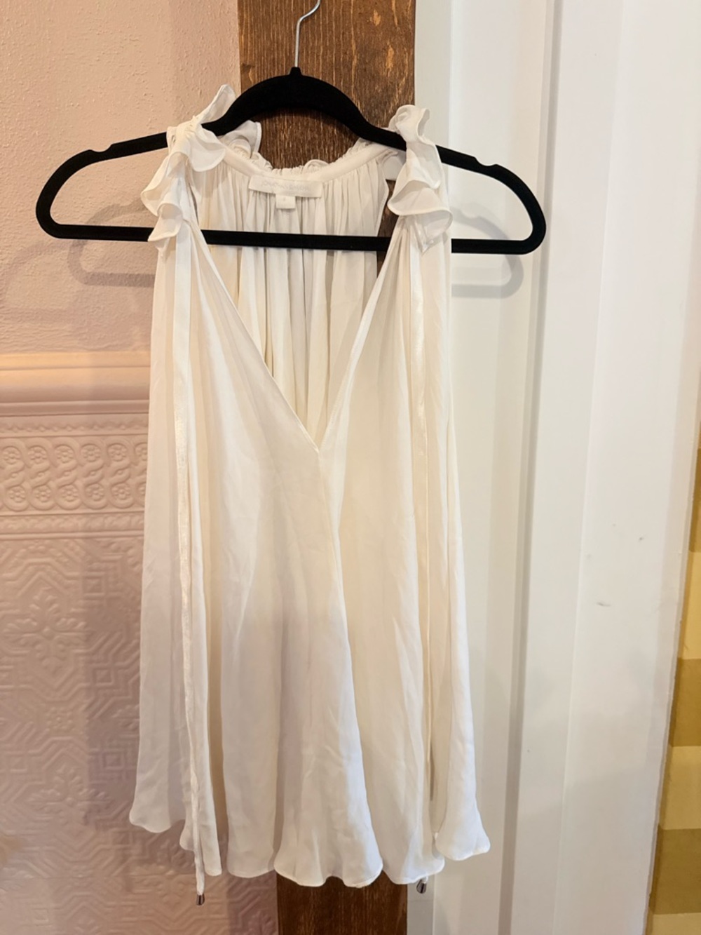 White Sleeveless Ruffled Too by Jonathan Simkhai.